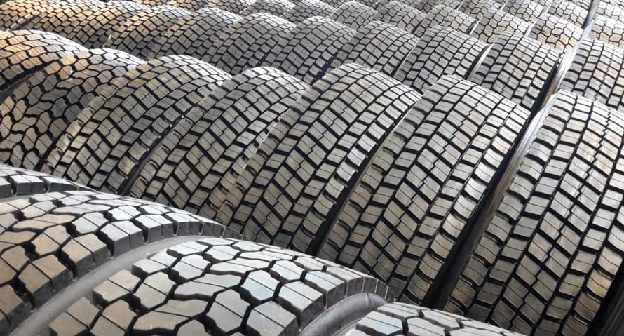 Car equipped with Bridgestone Potenza Sport tyres taking a sharp corner with high-speed stability.